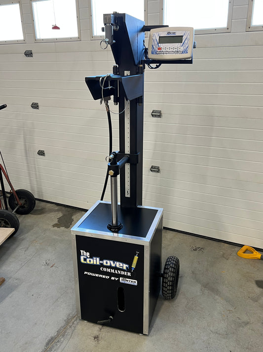 Coil-Over Commander Load Machine