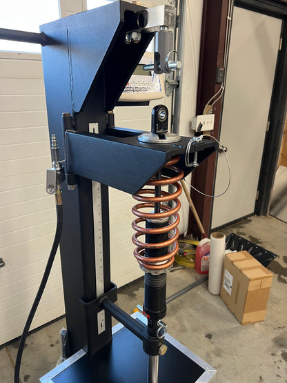 Coil-Over Commander Load Machine